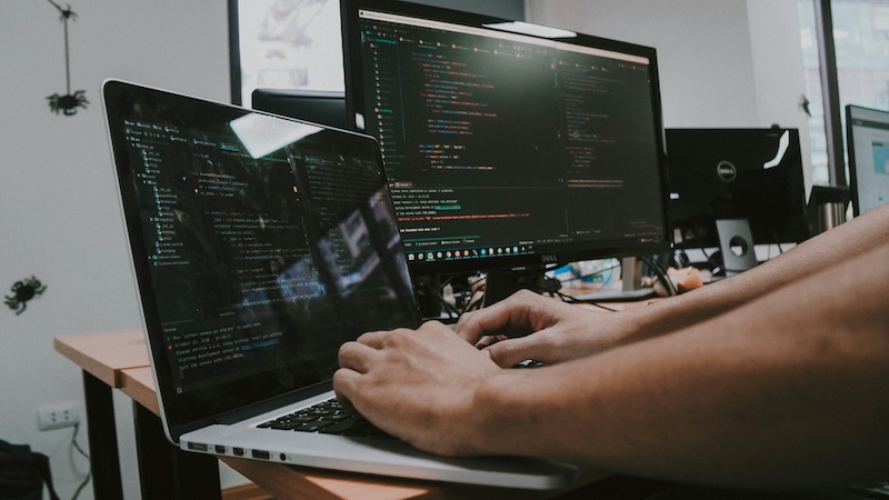 Software developer working with AI for software development